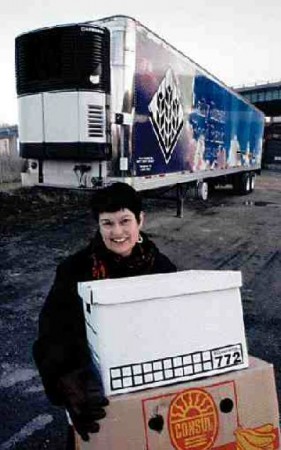 COOL DONATION: The Daily Bread Food Bank's Mary Anne Neville is thrilled with Train Trailer's donation of a reefer for both storage and transportation. But Canada's food banks are still facing a transportation crisis. See story, page 9. (Photo by John G. Smith)
