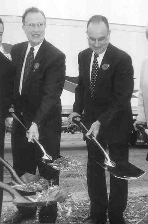 DIG IN: Mayor Jack Arthur and Great Dane's Phil Pines "turn the sod." (Photo by John Curran)