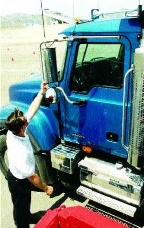SNAP TO IT: Breakaway mirrors help Mack's new Granites minimize downtime, while earning their keep.