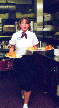 DINNER TIME: Dingwell's job as a server is a constant juggling act.