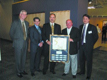 CONGRATS: Bison Transport recently celebrated its 35th anniversary with an awards presentation where company representatives were presented with the 2003 50 Best Managed Companies Award.Shown (left to right) are: Victor Bergmann, Brian DeGagne, Don Streuber, Duncan M. Jessiman and Anthony Kulbacki. n