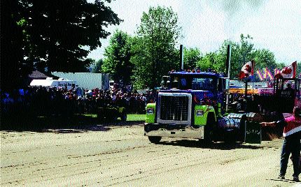 PULLING AHEAD: The roar of truck pull engines and the crowd supplied the show's soundtrack.