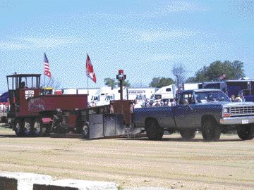 LEAD: Four-wheelers got in on the action at Fergus, like this 1984 Dodge Ram which came up just short of a 300 ft. "full-pull" during the truck pull competition.Photo by Adam Ledlow