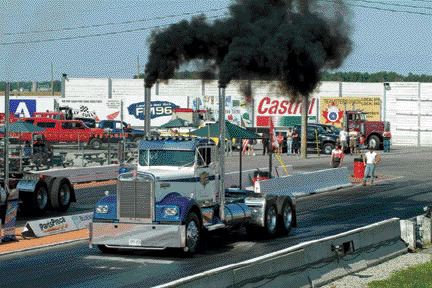 READY, SET...: A Kenworth dragster puts the pedal to the metal. A wide variety of trucks took to the drag strip in anger.