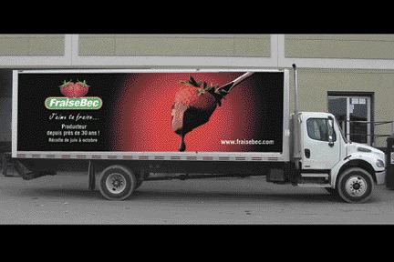 ADVERTISING ON WHEELS: Truck boxes can serve as rolling billboards rather than blank sidewalls.