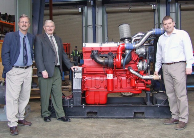 From left, Fred MacDonald, dean of Trades and Applied Technology, Ross Somerville, marketing manager for Cummins Western Canada, and Paul Mottershead, coordinator/instructor, Heavy-Duty Commercial Transport Mechanics program with the latest addition to the program: a Cummins ISX diesel engine.