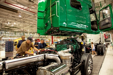 Employees assemble a Volvo VNL 780 at Volvo Trucks' New River Valley plant in Dublin, Va. The plant recently became the first US facility to achieve ISO 50001 certification.
