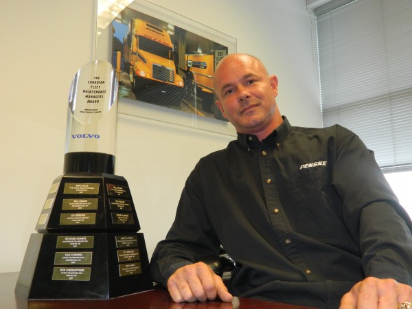 Lloyd De Merchant with the Fleet Maintenance Manager of the Year trophy.