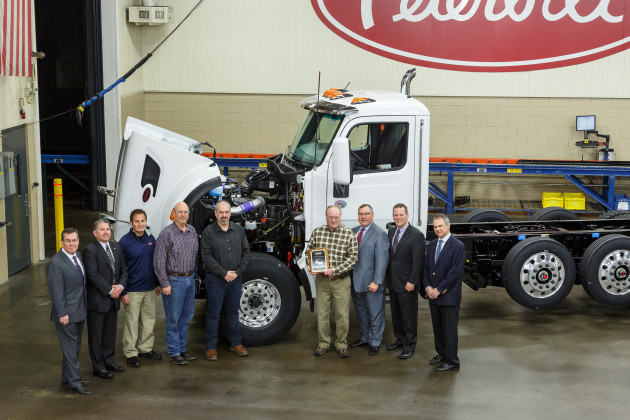 A recent customer event with Peterbilt presenting a Model 567 set-forward front axle truck equipped with the first production PACCAR MX-11 engine to Knife River CorporationFrom left to right: Charles Cook, Marketing Manager Vocational Products; Rick Paul, District Sales Manager; Ron Augustyn, Peterbilt Denton Plant Manager; Randy Kephart, Knife River Equipment Manager; Scott Hammond, Knife River Northwest Region Equipment Manager; Colin Milligan, Knife River Shop Manager; Robert Woodall, Peterbilt Assistant General Manager of Sales and Marketing; Leon Handt, Peterbilt Assistant General Manager of Operations; and Jim Zito, Director of Sales Vocational Products.