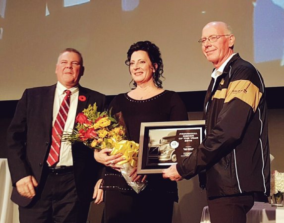 Roger Maltman, far right, of Bison Transport wins 2016 Driver of the Year at MTA Fall Awards Gala Nov. 4 in Winnipeg.