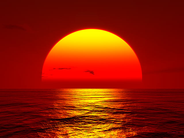 sunset-big-orange-sun-setting-over-ocean_0 - Truck News