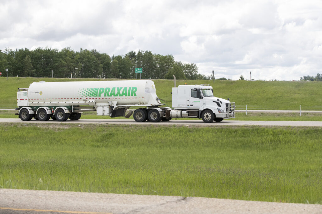 A Praxair truck hauling cargo north on the Queen Elizabeth II Highway near Edmonton, Alberta. Taken on June 14, 2020