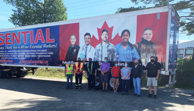 Essential workers pictured with Essential Trailer