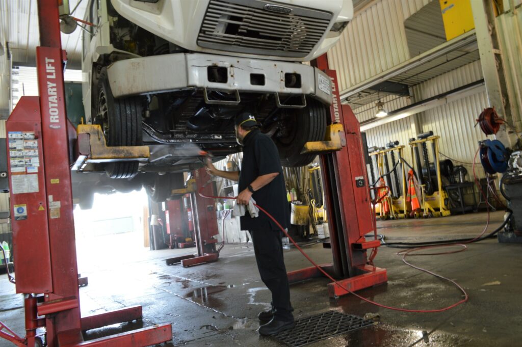 Paul Ainge works on a vehicle at a Krown shop in Vaughan, Ont. (Photo: Leo Barros)