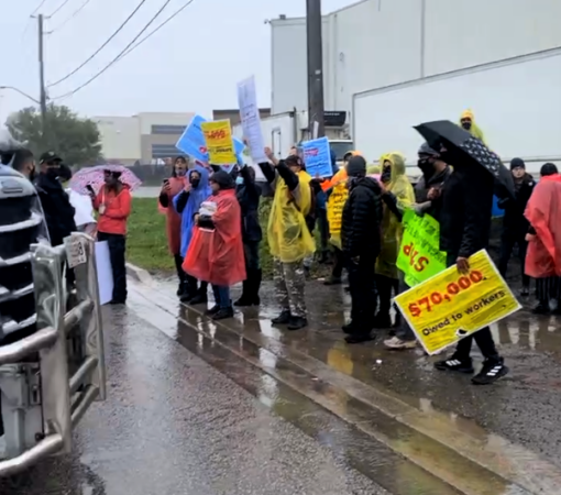People protest against unpaid wages outside an employer’s office in Brampton, Ont. on Oct. 30. (Photo: Fateh Media 5)