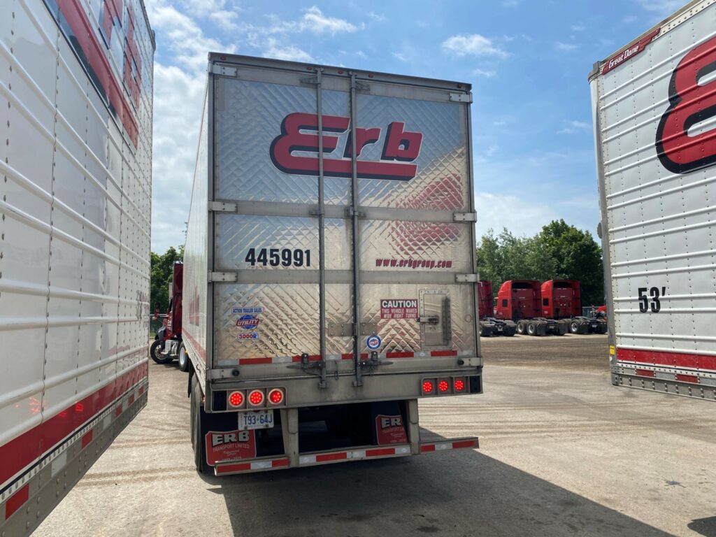 Erb truck backing into position