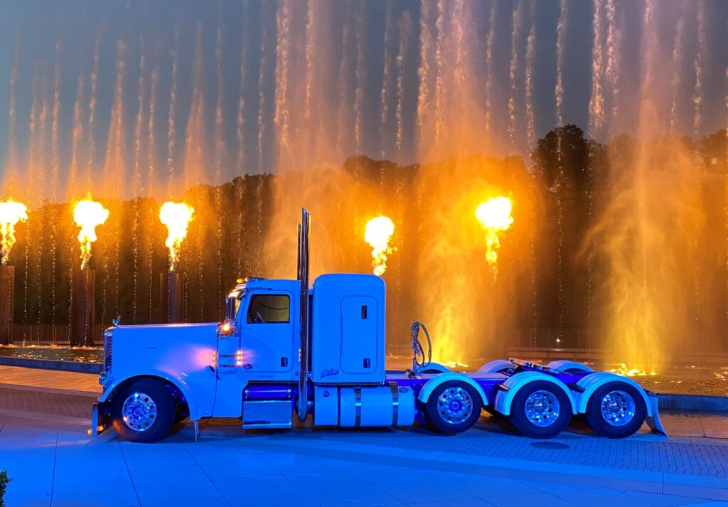 Truck parked in front of a fountain during Shell Rotella SuperRigs 2022