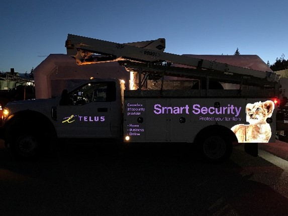 Picture of a Telus vehicle at night