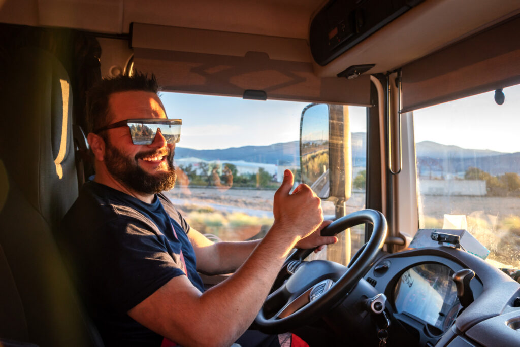 Picture of truck driver giving a thumbs up