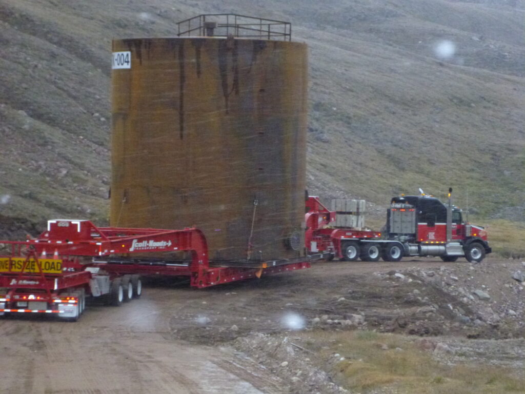 Picture of a truck hauling an oversized load.