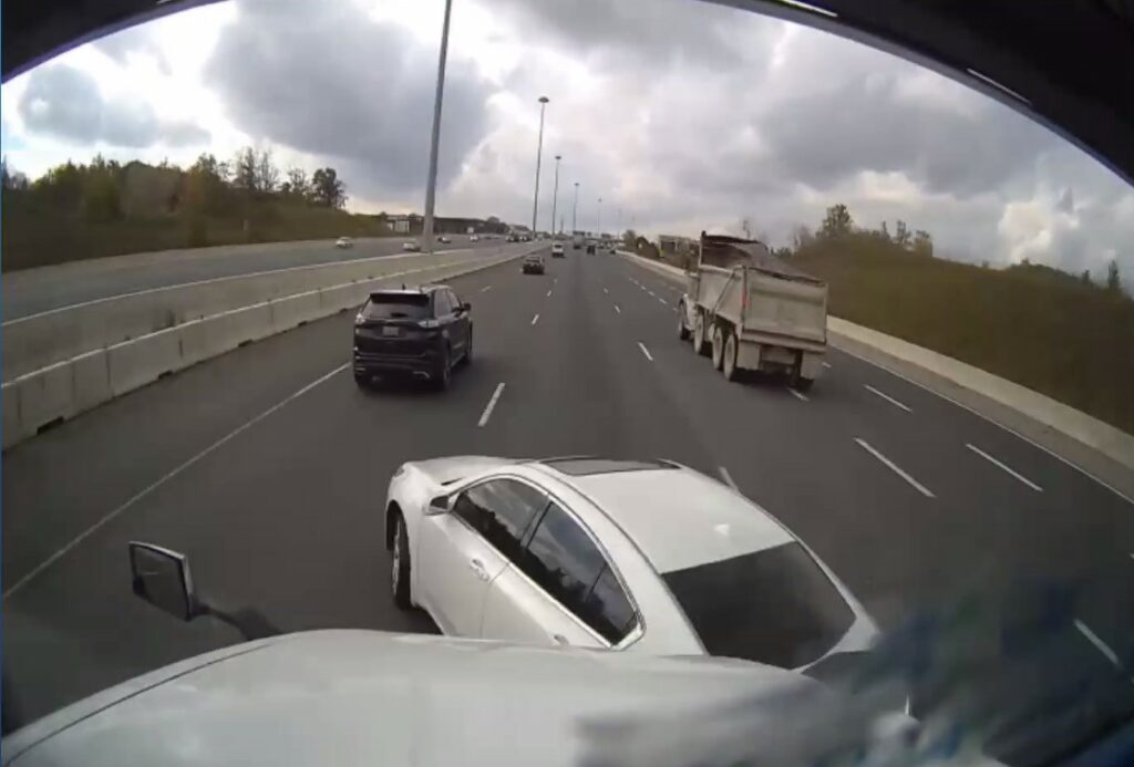 Image of a car crashing into a truck