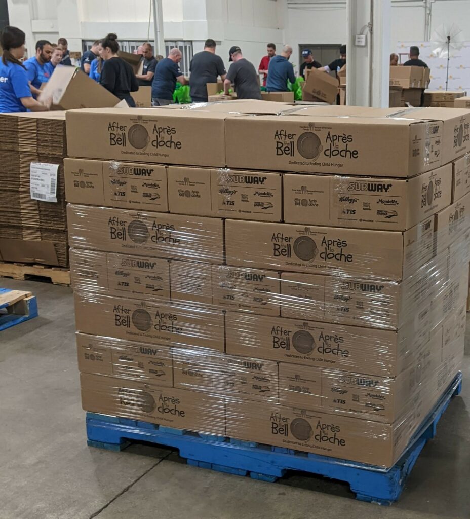 Picture of a pallet with people in the background