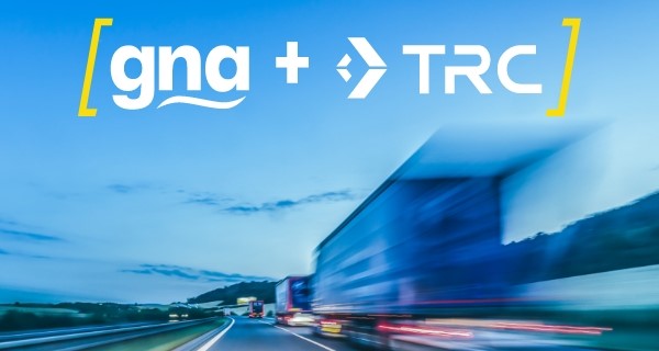 Picture of trucks on a road with GNA and TRC superimposed on the image.