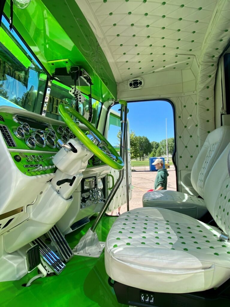 The green interior of a truck at SuperRigs