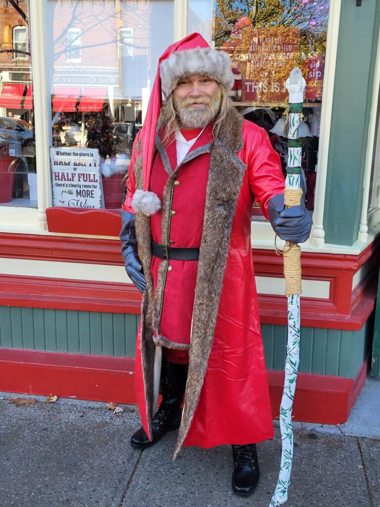 The photo is of Dave Bennison, dressed as Santa Clause, outside of a Christmas store in Niagara-on-the-Lake
