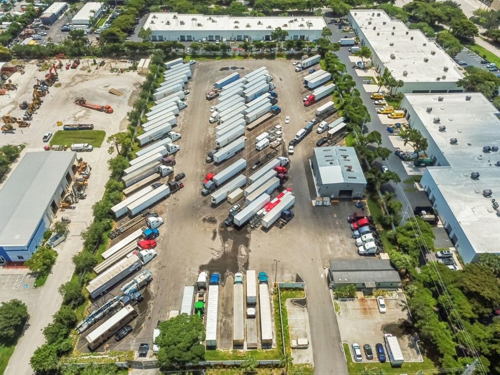Overhead picture of trucks parked at a truck stop.